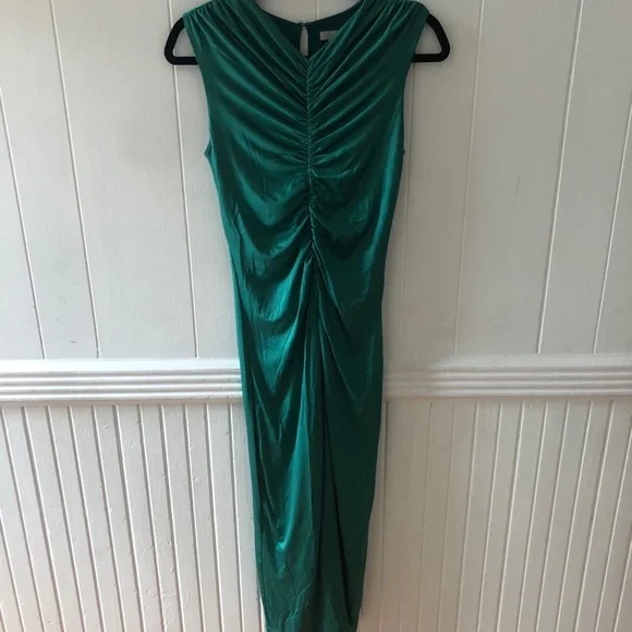h&m conscious green dress In love with this dress from the @hm Conscious Exclusive collection, inspired by the 'beauty of waste' -giving new life to something that was once considered trash by turning it into beautiful
